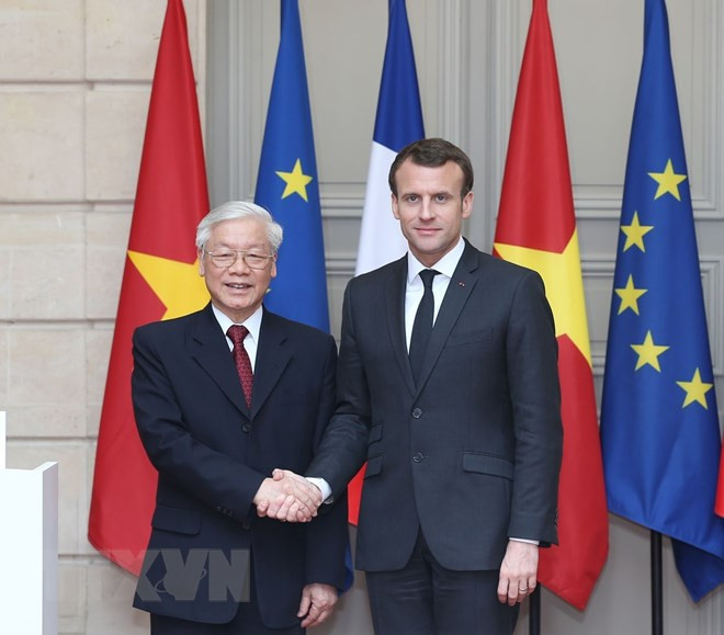 Tổng Bí thư Nguyễn Phú Trọng và Tổng thống Cộng hòa Pháp Emmanuel Macron.