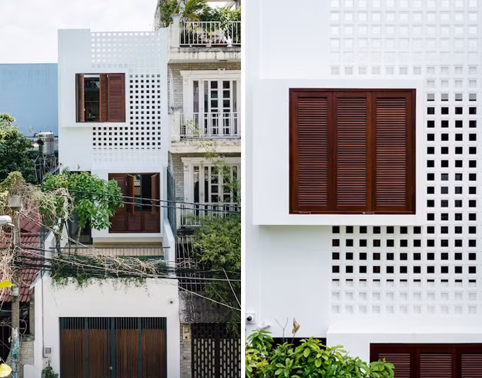  Chủ ngôi nhà 3 tầng ở quận 11 (TP HCM) sinh ra và lớn lên trong một khu dân cư lâu đời. Nơi này vẫn còn nhiều công trình xây từ những năm 1970 với các đặc điểm thiết kế hợp lý cho vùng nhiệt đới như gạch thông gió, cửa sổ lá sách, lam che nắng. Bởi vậy, khi xây lại nhà, kiến trúc sư cũng áp dụng các ý tưởng kiến trúc truyền thống này.