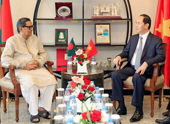 Chủ tịch nước Trần Đại Quang tiếp Chủ tịch đảng Công nhân Bangladesh Rashed Khan Menon. (Ảnh: Nhan Sáng/TTXVN)