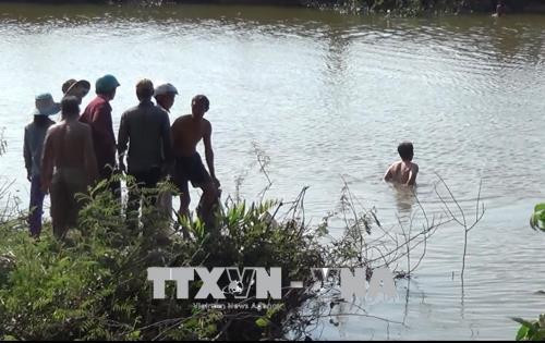  Khúc sông nơi các nạn nhân bị đuối nước. Ảnh: Phước Ngọc/TTXVN