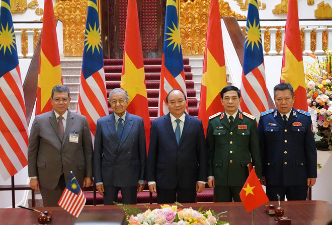 Hai Thủ tướng chứng kiến lễ ký ý định thư về việc ký thỏa thuận hợp tác về thực thi luật pháp và tìm kiếm cứu nạn trên biển - Ảnh Ngọc Thắng Hai Thủ tướng chứng kiến lễ ký ý định thư về việc ký thỏa thuận hợp tác về thực thi luật pháp và tìm kiếm cứu nạn trên biển - Ảnh Ngọc Thắng