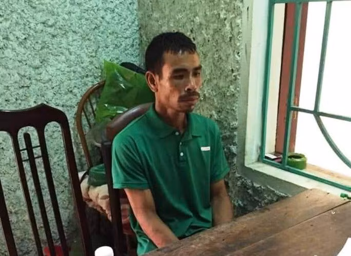 Nghi phạm Bùi Văn Tiển tại cơ quan công an sau 10 ngày cố thủ trên núi