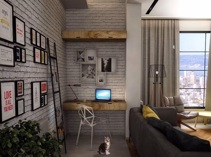  Góc bàn làm việc tách biệt với phòng khách nhờ cách trang trí màu tường khác biệt mà không cần sử dụng đến vách ngăn. 