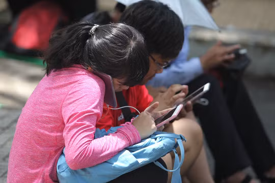 Người dùng di động của 3 mạng là VinaPhone, Gmobile, Vietnamobile đã được hoàn tất chuyển đổi SIM 11 số về 10 số. Ảnh minh họa: Hoàng Triều.