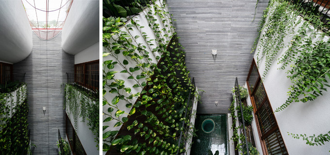 Hồ nước màu xanh rêu nằm trong khuôn viên giếng trời giữa nhà lấp lánh ánh nắng phản quang lên mảng tường đá, lên mái hiên trần gỗ phòng khách và phòng ăn hai bên. Các không gian trong nhà liên thông theo một trục xuyên suốt, hướng mở ra thiên nhiên, cây xanh, khí trời. Hồ nước màu xanh rêu nằm trong khuôn viên giếng trời giữa nhà lấp lánh ánh nắng phản quang lên mảng tường đá, lên mái hiên trần gỗ phòng khách và phòng ăn hai bên. Các không gian trong nhà liên thông theo một trục xuyên suốt, hướng mở ra thiên nhiên, cây xanh, khí trời.