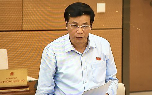 Tổng Thư ký Quốc hội Nguyễn Hạnh Phúc trình bày Tờ trình Đề án thực hiện thí điểm hợp nhất Văn phòng Đoàn đại biểu Quốc hội, Văn phòng Hội đồng nhân dân và Văn phòng Ủy ban nhân dân cấp tỉnh. Tổng Thư ký Quốc hội Nguyễn Hạnh Phúc trình bày Tờ trình Đề án thực hiện thí điểm hợp nhất Văn phòng Đoàn đại biểu Quốc hội, Văn phòng Hội đồng nhân dân và Văn phòng Ủy ban nhân dân cấp tỉnh.