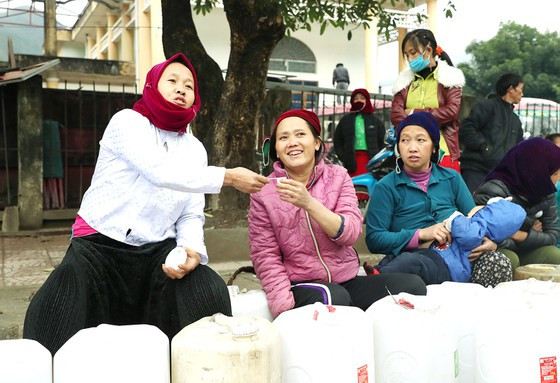 Món rượu ngô truyền thống của xã Cán Chu Phìn thường được chị em nấu, ủ và mang xuống chợ