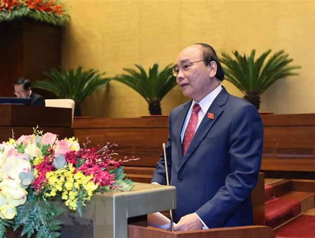 Thủ tướng Nguyễn Xuân Phúc trình bày báo cáo tổng kết của Chính phủ nhiệm kỳ 2016-2021 tại phiên khai mạc Kỳ họp lần thứ 11, Quốc hội khóa XIV. (Ảnh: Thống Nhất/TTXVN)