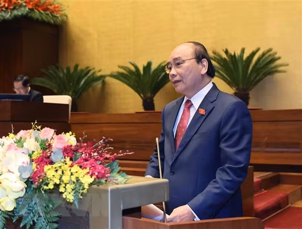 Thủ tướng Nguyễn Xuân Phúc trình bày báo cáo tổng kết của Chính phủ nhiệm kỳ 2016-2021 tại phiên khai mạc Kỳ họp lần thứ 11, Quốc hội khóa XIV. (Ảnh: Thống Nhất/TTXVN)