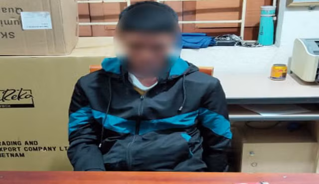 Nghi phạm D.Đ.T. tại cơ quan công an.