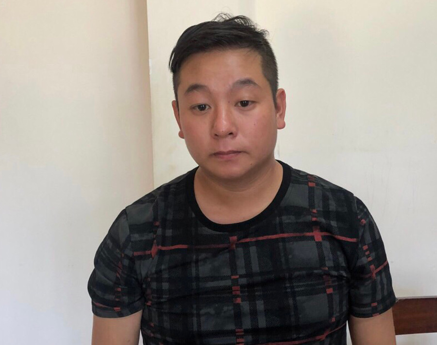 Đối tượng Nguyễn Hoàng Ngọc Anh tại cơ quan Công an. Ảnh: Văn Ngọc a