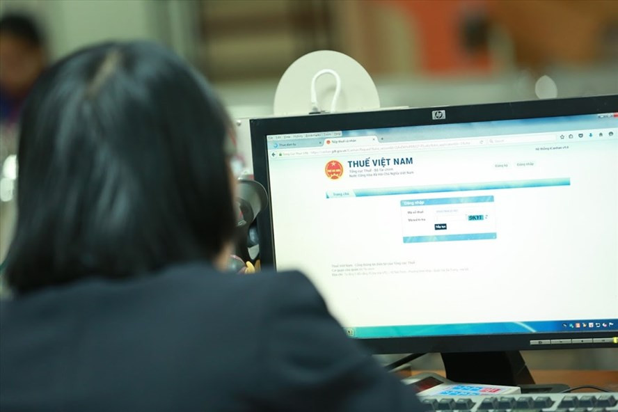 Việc nhanh chóng vào cuộc để xử lý khoanh, xoá nợ phần nào giảm áp lực với quản lý thuế, mặt khác góp phần tháo gỡ khó khăn cho doanh nghiệp. Ảnh Hải Nguyễn.