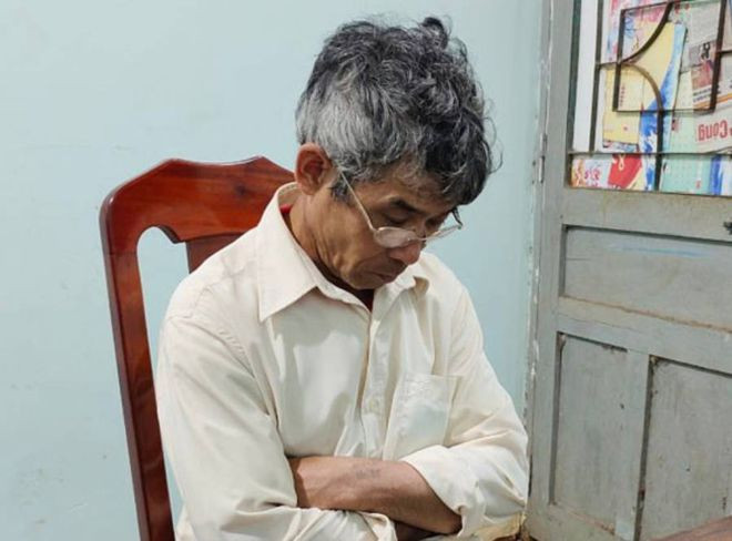 Trần Duy Tựa tại cơ quan công an. ẢNH: PHAN BÁ