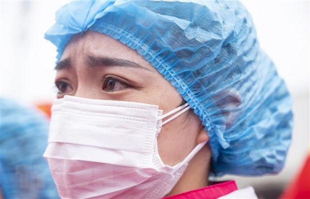 Một nữ y tá làm viêc tại bệnh viện ở Vũ Hán, tỉnh Hồ Bắc, Trung Quốc, ngày 29/3/2020. (Ảnh: THX/TTXVN)