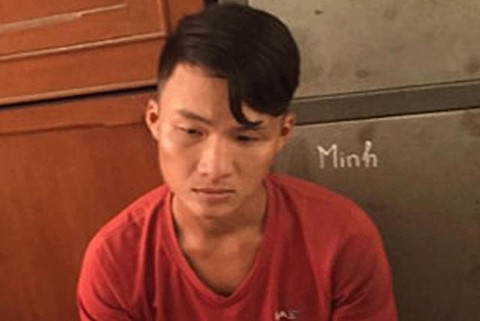 Thái bị cảnh sát tạm giữ để điều tra. Ảnh: Anh Minh. 