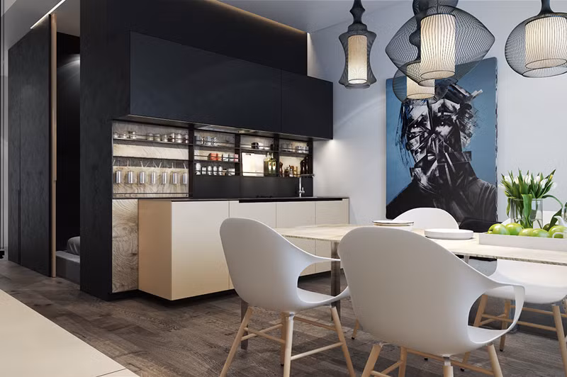  Bếp nấu đặt cạnh bàn ăn, được sắp xếp gọn gàng.