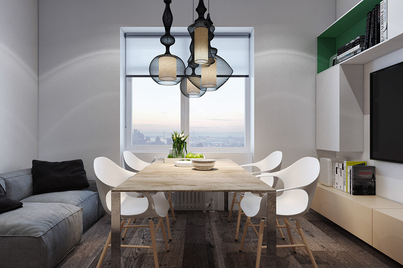 Việc kết hợp bàn ăn với bàn phòng khách giúp căn hộ 39 m2 tiết kiệm được tối đa diện tích. Việc kết hợp bàn ăn với bàn phòng khách giúp căn hộ 39 m2 tiết kiệm được tối đa diện tích.