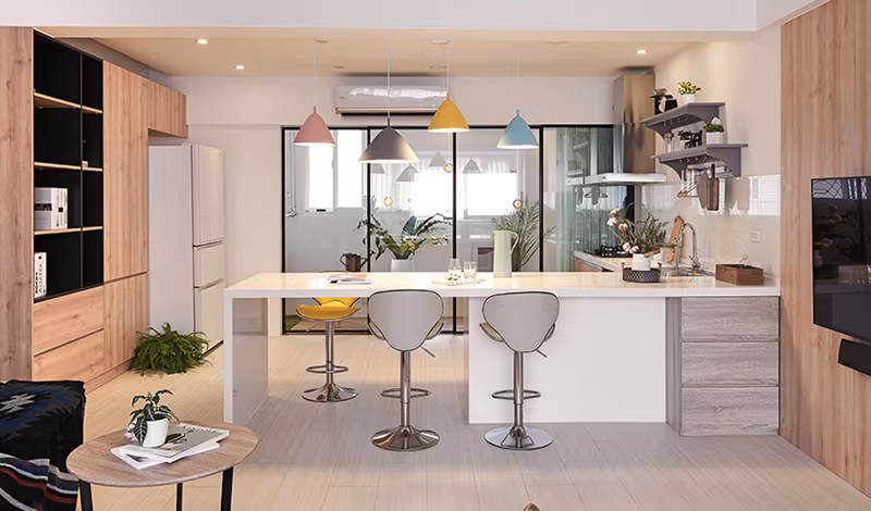 Đảo bếp đồng thời là quầy bar, bàn làm việc tiện lợi.