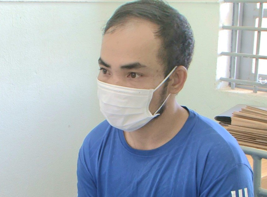 Phan Văn Tiện tại cơ quan công an. Ảnh: CA