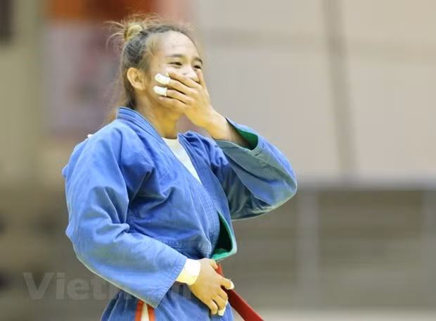  Vận động viên Nguyễn Phạm Hồng Mơ giành huy chương vàng nội dung 52kg nữ. (Ảnh: PV/Vietnam+)