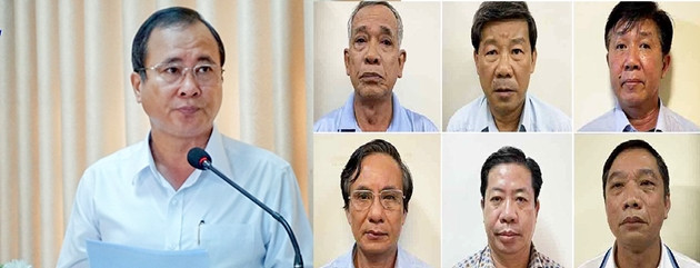 Ông Trần Văn Nam (bìa trái) cùng các bị can trong vụ án - Ảnh: Bộ Công an