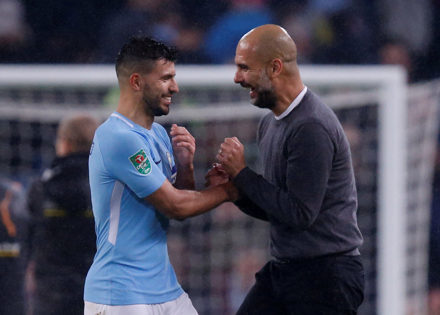 Niềm vui của HLV Guardiola (phải) và tiền đạo Aguero sau khi M.C giành vé đi tiếp. Ảnh: REUTERS Niềm vui của HLV Guardiola (phải) và tiền đạo Aguero sau khi M.C giành vé đi tiếp. Ảnh: REUTERS