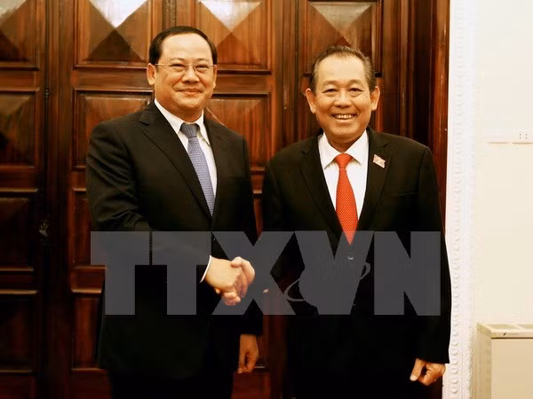 Phó Thủ tướng Thường trực Trương Hòa Bình đón và hội đàm với Phó Thủ tướng Lào Sonesay Siphandone.