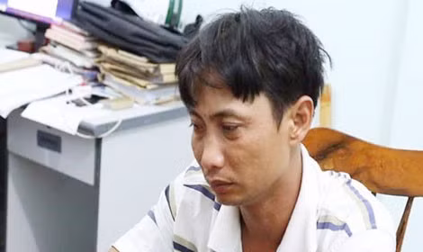 Đối tượng Hà Tuấn Vinh sau khi bị bắt. Ảnh : CAND.