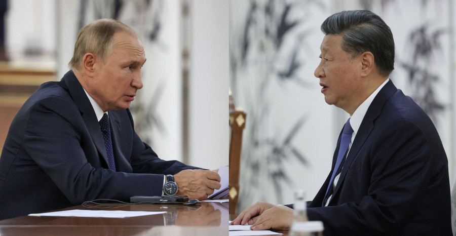 Tổng thống Nga Vladimir Putin và Chủ tịch Trung Quốc Tập Cận Bình tại cuộc gặp bên lề hội nghị thượng đỉnh của Tổ chức Hợp tác Thượng Hải ở thành phố Samarkand, Uzbekistan ngày 15.9 - Ảnh: Reuters