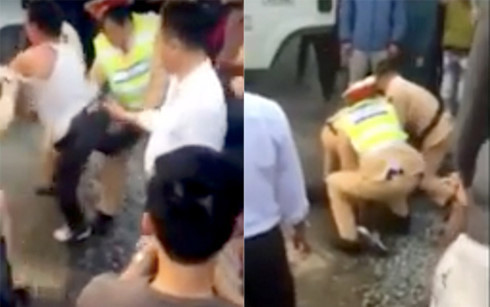 Tài xế xe tải bị cảnh sát khống chế.