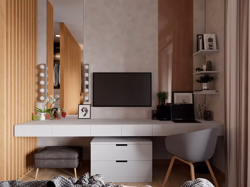 Tivi đặt cạnh bàn trang điểm tiết kiệm diện tích.