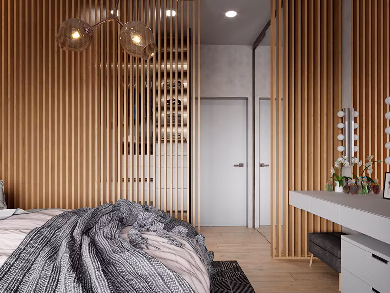 Rèm gỗ cho phép ánh sáng tự do di chuyển trong phòng ngủ.