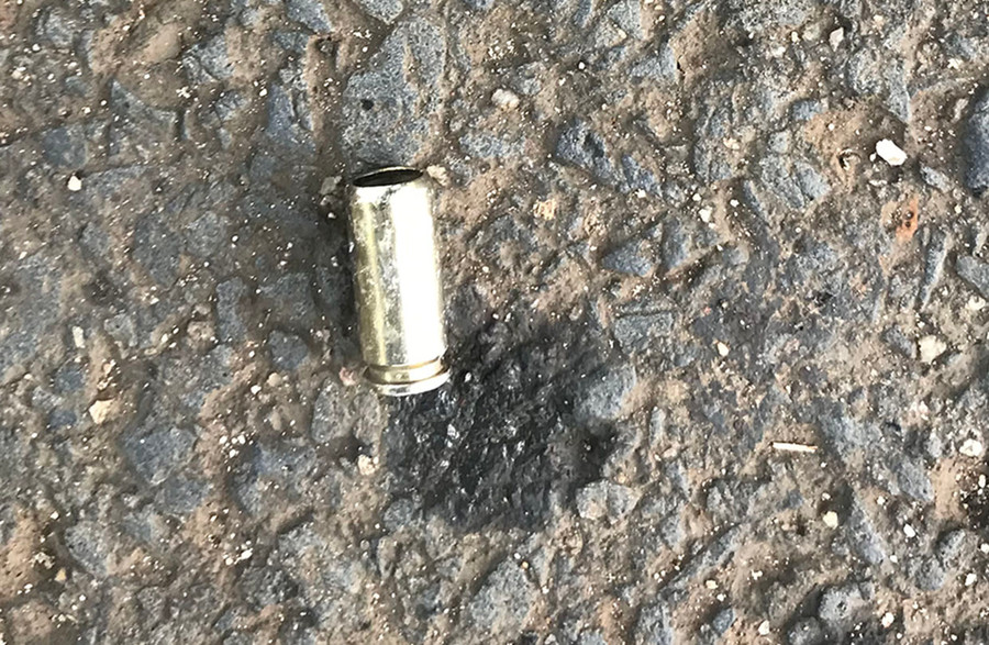 1 vỏ đạn được thu giữ tại hiện trường. Ảnh: Văn Ngọc 1 vỏ đạn được thu giữ tại hiện trường. Ảnh: Văn Ngọc