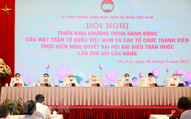 Đoàn Chủ tọa hội nghị trực tuyến toàn quốc triển khai chương trình hành động của Mặt trận Tổ quốc Việt Nam và các tổ chức thành viên thực hiện Nghị quyết Đại hội đại biểu toàn quốc lần thứ XIII của Đảng. (Ảnh: Phương Hoa/TTXVN)