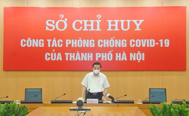 Ông Chu Ngọc Anh, Chủ tịch Ủy ban nhân dân thành phố phát biểu tại cuộc họp. (Ảnh: PV/Vietnam+)