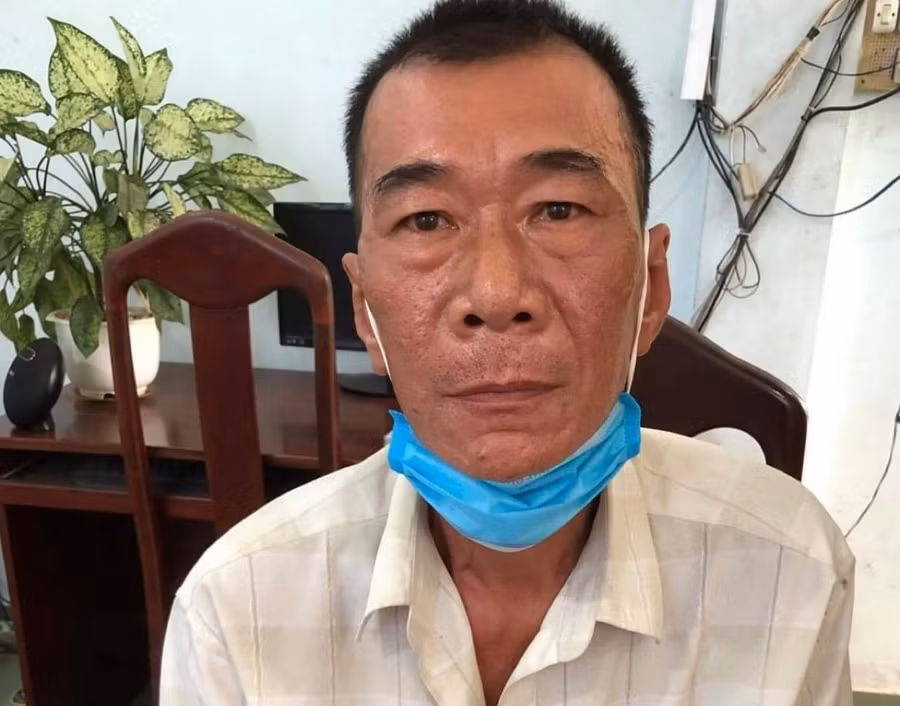 Đinh Điền Trung tại cơ quan công an- Ảnh: Công an cung cấp