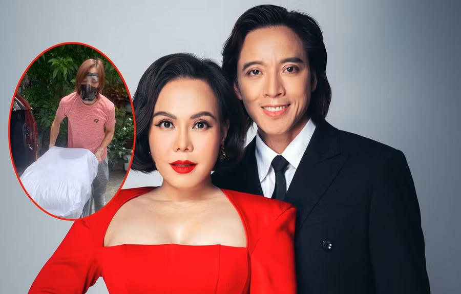 Việt Hương và ông xã trao các nhu yếu phẩm, bánh cho người dân, các lực lượng tuyến đầu. Ảnh: FBNV