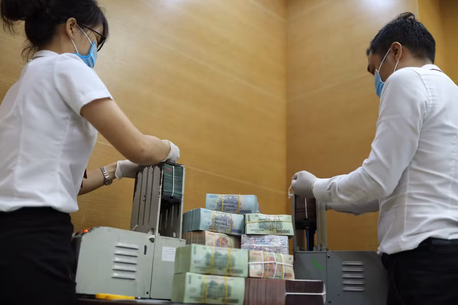 Dự kiến các giải pháp hỗ trợ thuế đối với doanh nghiệp, hộ kinh doanh, cá nhân bị ảnh hưởng dịch Covid-19. Ảnh: Ngọc Thắng