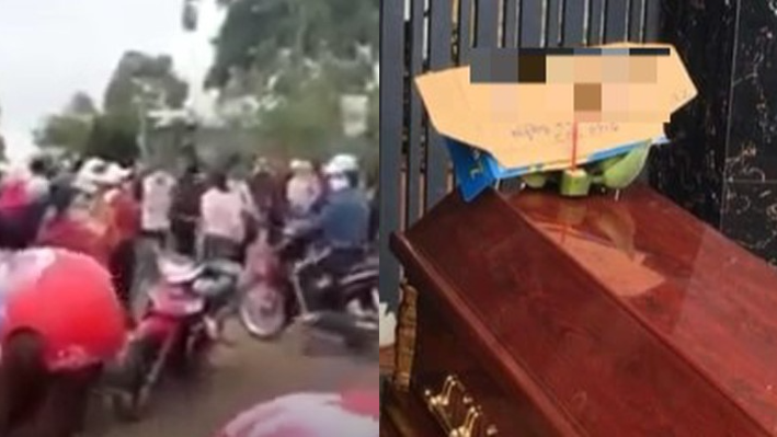Nhiều người tụ tập để đòi nợ chủ hụi, mang cả quan tài đến đặt trước cổng. Ảnh: Chụp màn hình