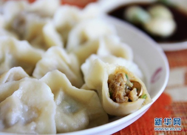 Món sủi cảo của người Trung Quốc. Ảnh: News.cn Món sủi cảo của người Trung Quốc. Ảnh: News.cn