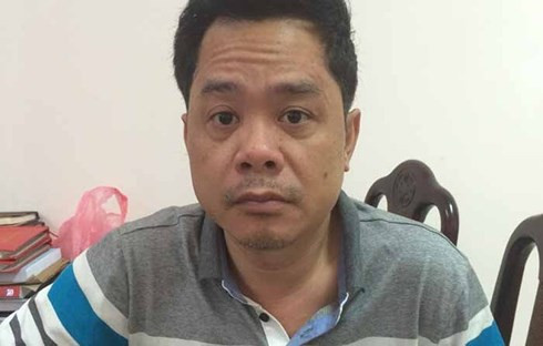 Dũng "mượt" ngày mới bị bắt. Ảnh: Cơ quan điều tra cung cấp. Dũng