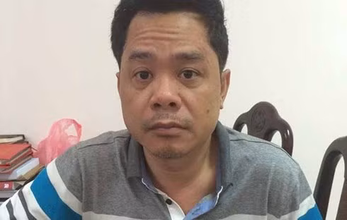 Dũng "mượt" ngày mới bị bắt. Ảnh: Cơ quan điều tra cung cấp. Dũng