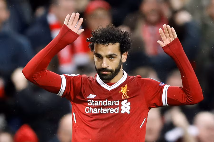 Salah không ăn mừng sau khi mở tỉ số cho Liverpool. Ảnh: REUTERS