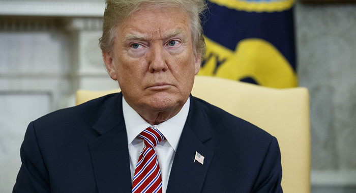 Tổng thống Trump ngày 11-4 đã cảnh báo tên lửa Mỹ sẽ tấn công Syria - Ảnh: REUTERS