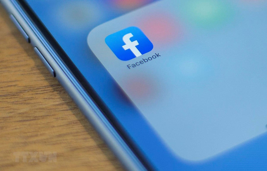 Biểu tượng Facebook trên màn hình điện thoại. (Ảnh: AFP/TTXVN) Biểu tượng Facebook trên màn hình điện thoại. (Ảnh: AFP/TTXVN)