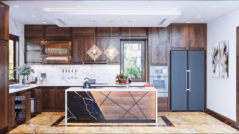  Mặt tủ bếp và đảo ốp đá cũng với mục đích tương tự.