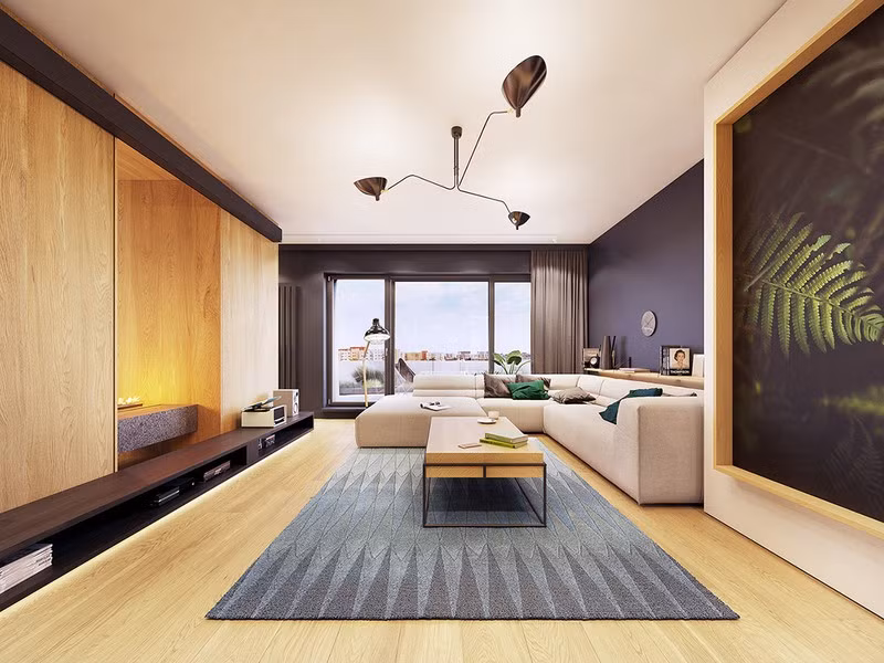 Trung tâm của phòng khách là nơi đặt bàn cà phê bằng kim loại màu đen với bề mặt lát gỗ. Bàn được đặt trên một tấm thảm họa tiết hình kim cương, thật phong cách.