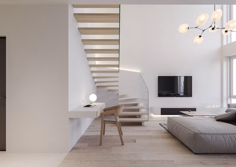 Chủ nhà cũng tận dụng gầm cầu thang để đặt bàn làm việc nhằm tiết kiệm diện tích.