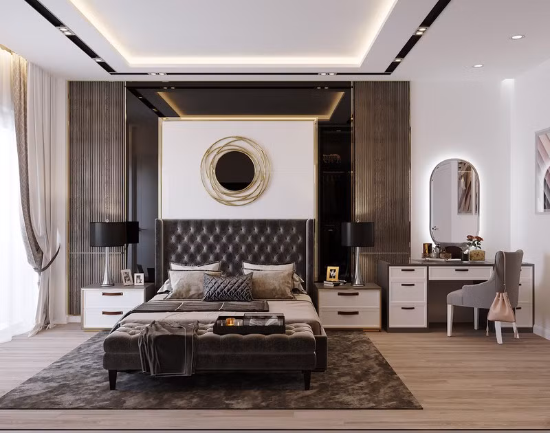 Phòng ngủ chính có diện tích rộng nhất ngôi nhà với một chiếc giường bọc nệm đặt ở trung tâm.