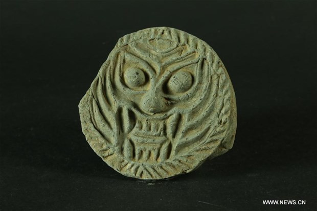  Một hiện vật được khai quật tại khu mộ cổ. (Nguồn: news.cn)